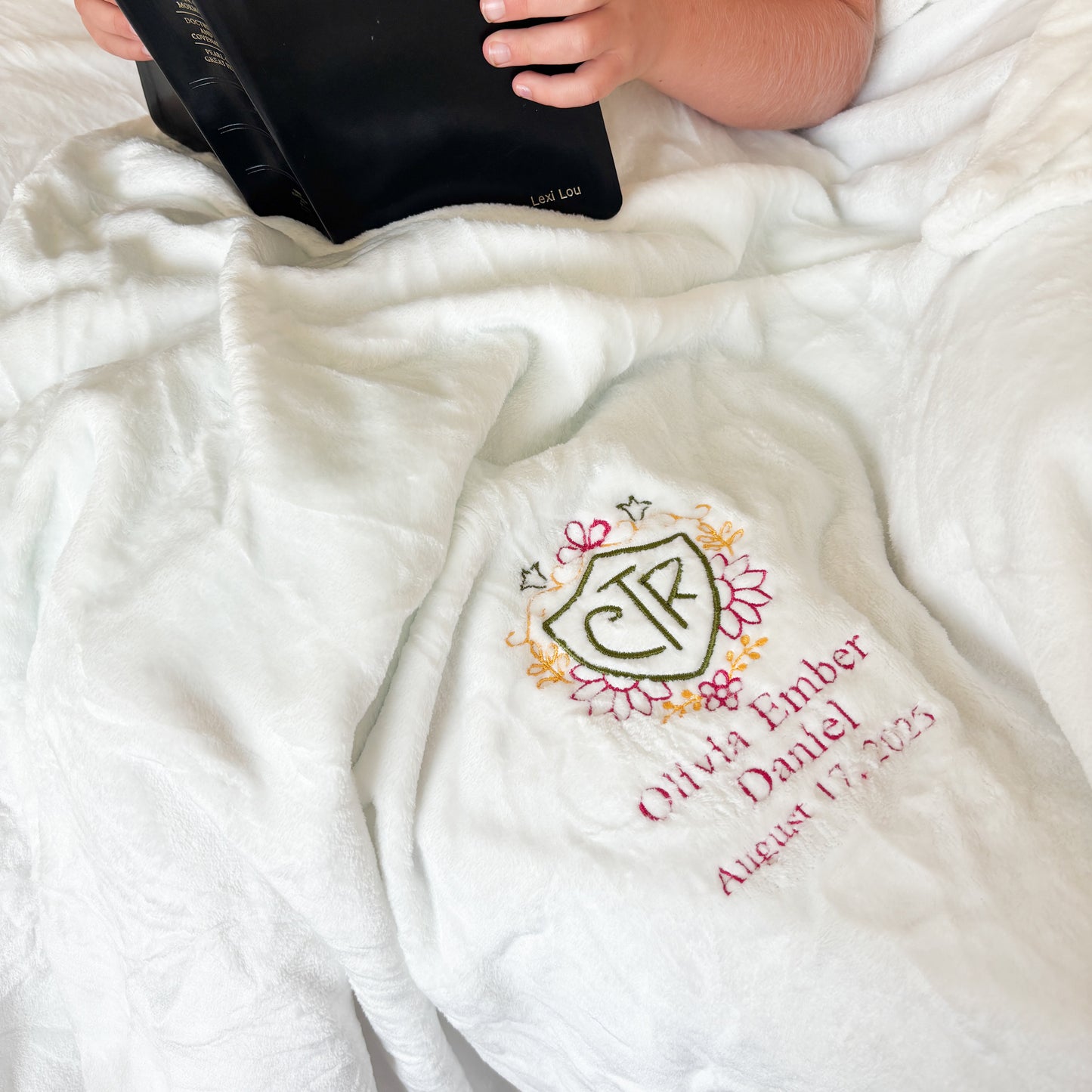 Beautiful floral CTR sherpa baptism blanket for church of jesus christ of latter day saints with little girl reading scriptures