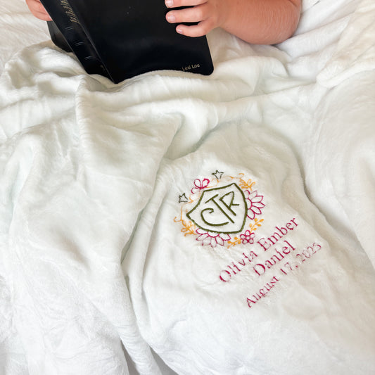 Beautiful floral CTR sherpa baptism blanket for church of jesus christ of latter day saints with little girl reading scriptures